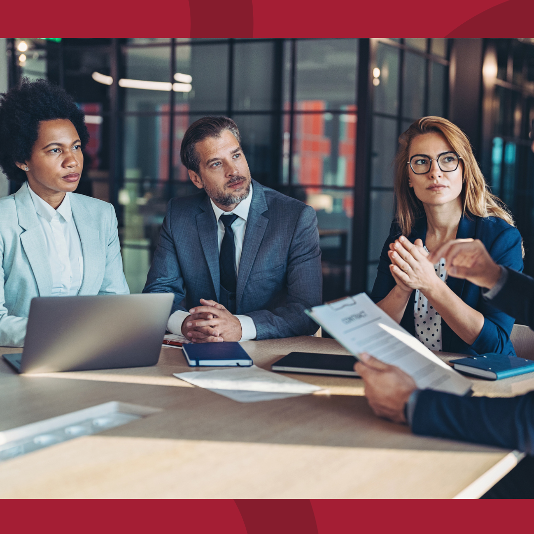 A group of business people in a meeting.